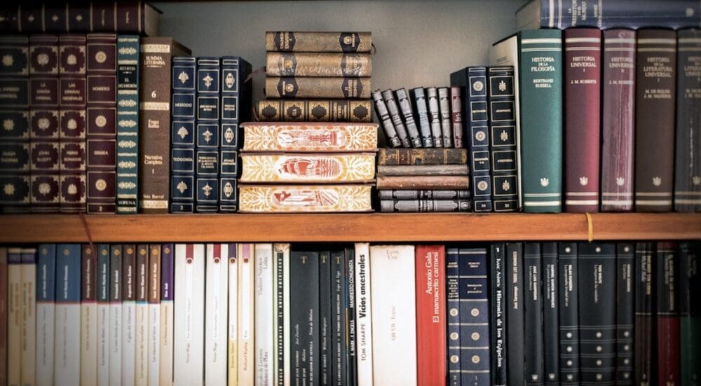 A bookshelf with many books on it